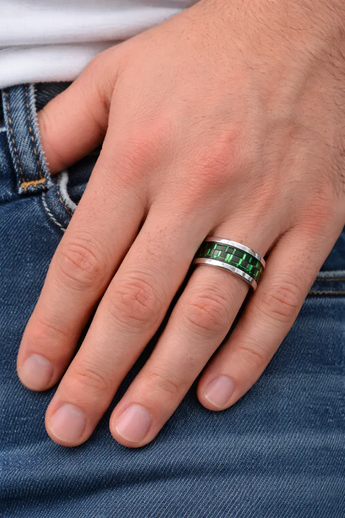 tungsten-ring-with-inlay-carbon-fiber-green-center-on-hand-2.webp