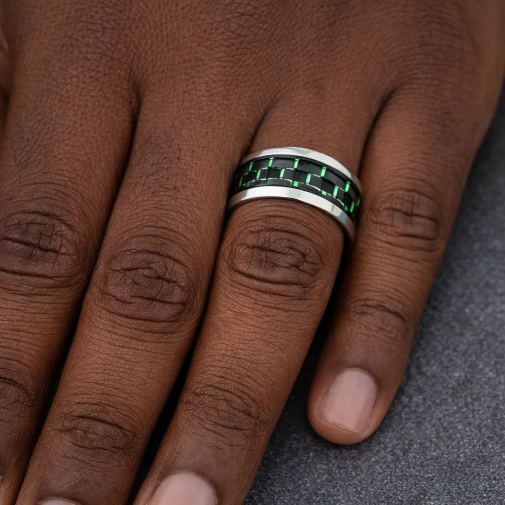 tungsten-ring-with-inlay-carbon-fiber-green-center-on-hand.webp