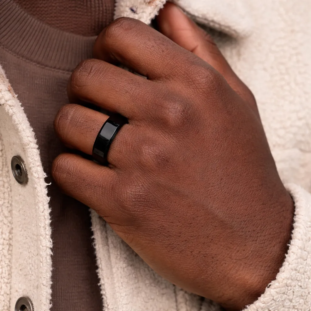 beveled-black-tungsten-ring-polished-on-hand-2.webp