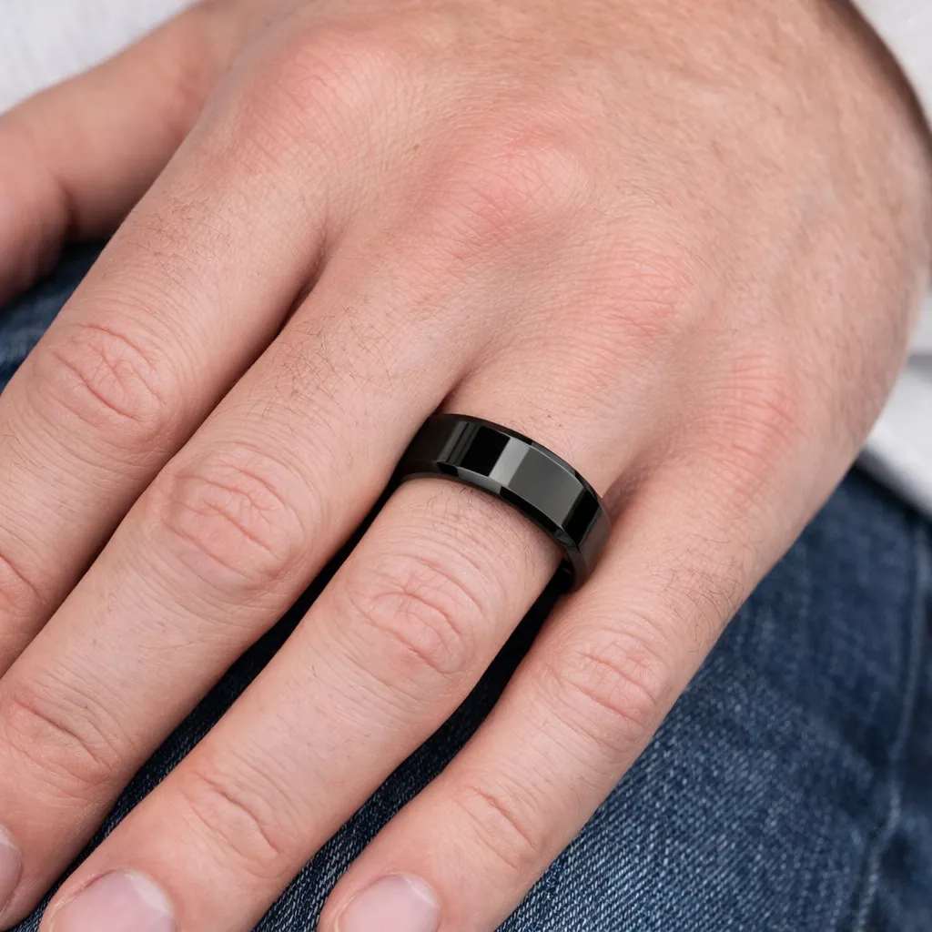 beveled-black-tungsten-ring-polished-on-hand.webp